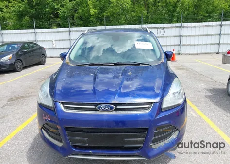 2014 Ford Escape Titanium z USA, uszkodzony, nr VIN 1FMCU9JX4EUA04520